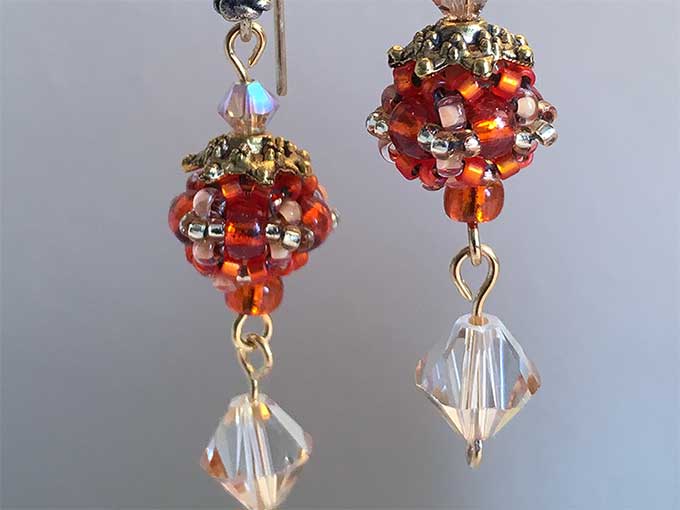 Ohrringe 'shining ball' orange-gold